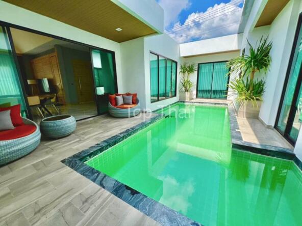 Luxurious 3-bedroom pool villa nestled in a lush, gated community