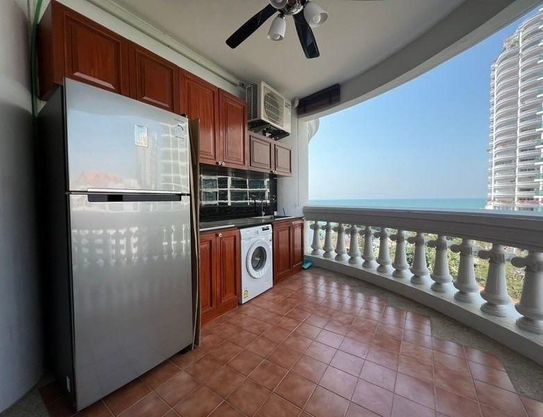 Luxurious 2-bedroom condo interior at Park Beach Wongamat in Pattaya with a view of the sea.