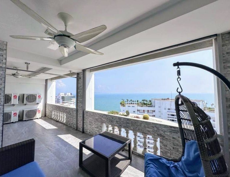 Luxurious 2-bedroom condo with panoramic sea views at Jomtien Complex Condotel in Pattaya.